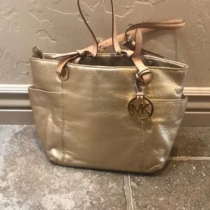 Metallic gold purse.